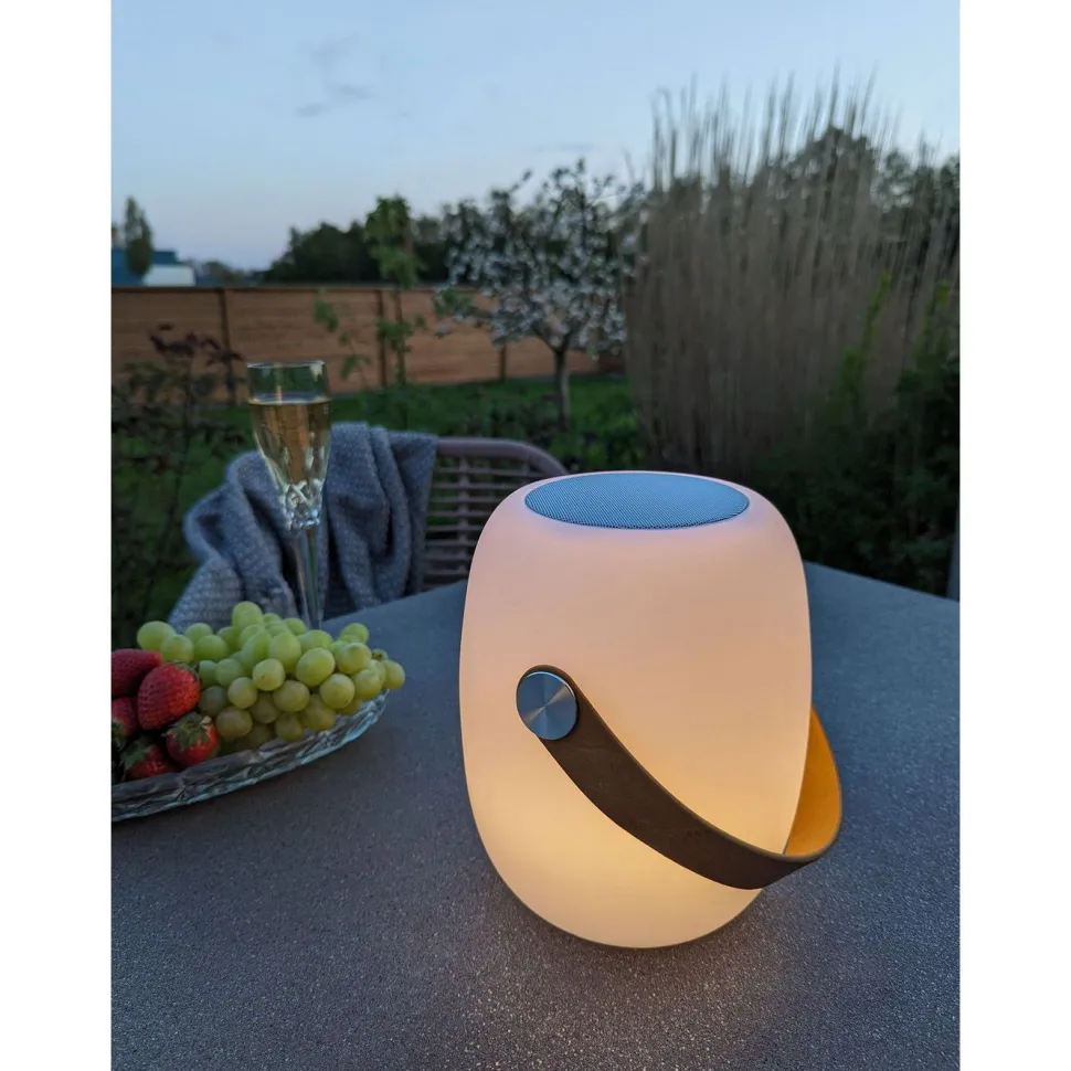Ladattava pöytävalaisin House Nordic Cardiff, Bluetooth-kaiuttimella, ø18cm, sisä- ja ulkokäyttöön, valkoinen/ruskea